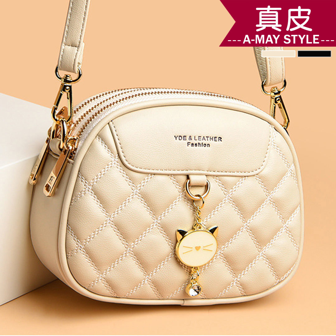 真皮包-休閒菱格貓咪吊飾斜背小圓包【XDC255839】＊艾美時尚(現 預)